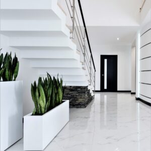 Commercial setting, white stone flooring.