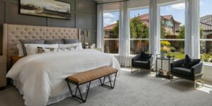 Luxury Primary Bedroom features carpet.