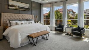 Luxury Primary Bedroom features carpet.